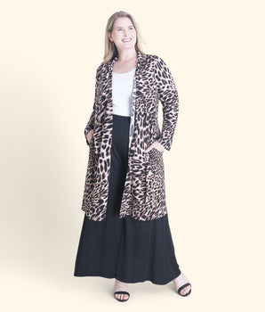 Woman posing wearing Black Bianca Leopard Print Cardigan from Connected Apparel