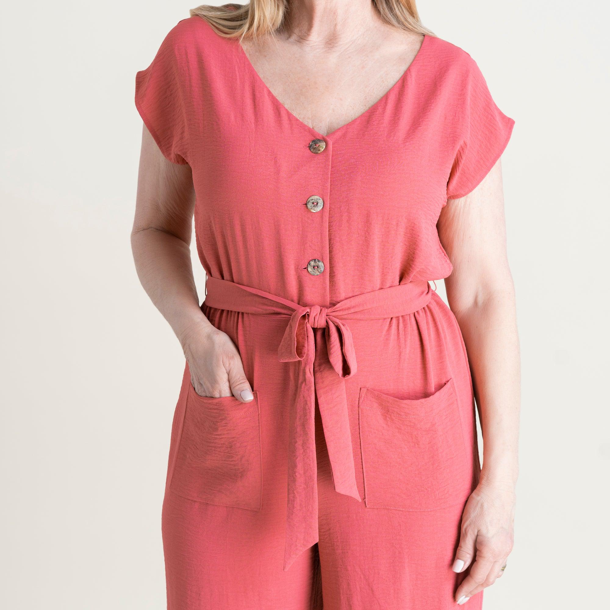Woman posing wearing Rosewood Frida Rosewood Two-Pocket Jumpsuit from Connected Apparel