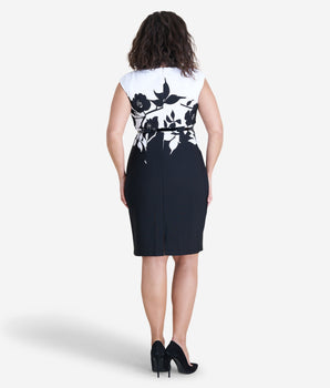 Woman posing wearing Black Jane Work Dress from Connected Apparel