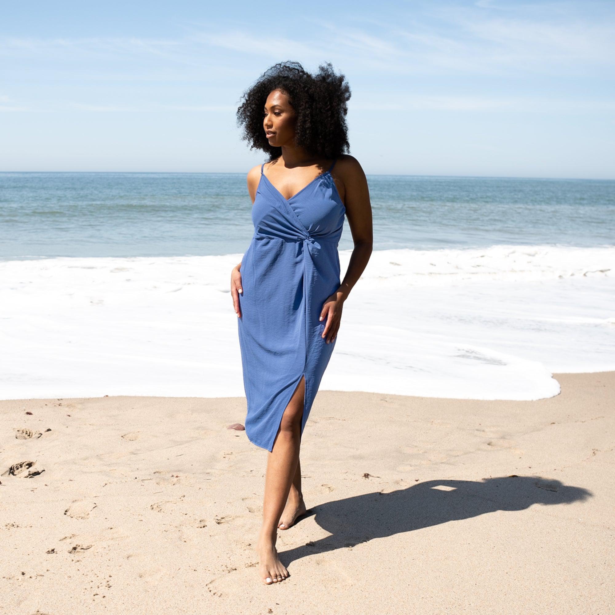 Woman posing wearing Denim Leila Knotted Dress from Connected Apparel