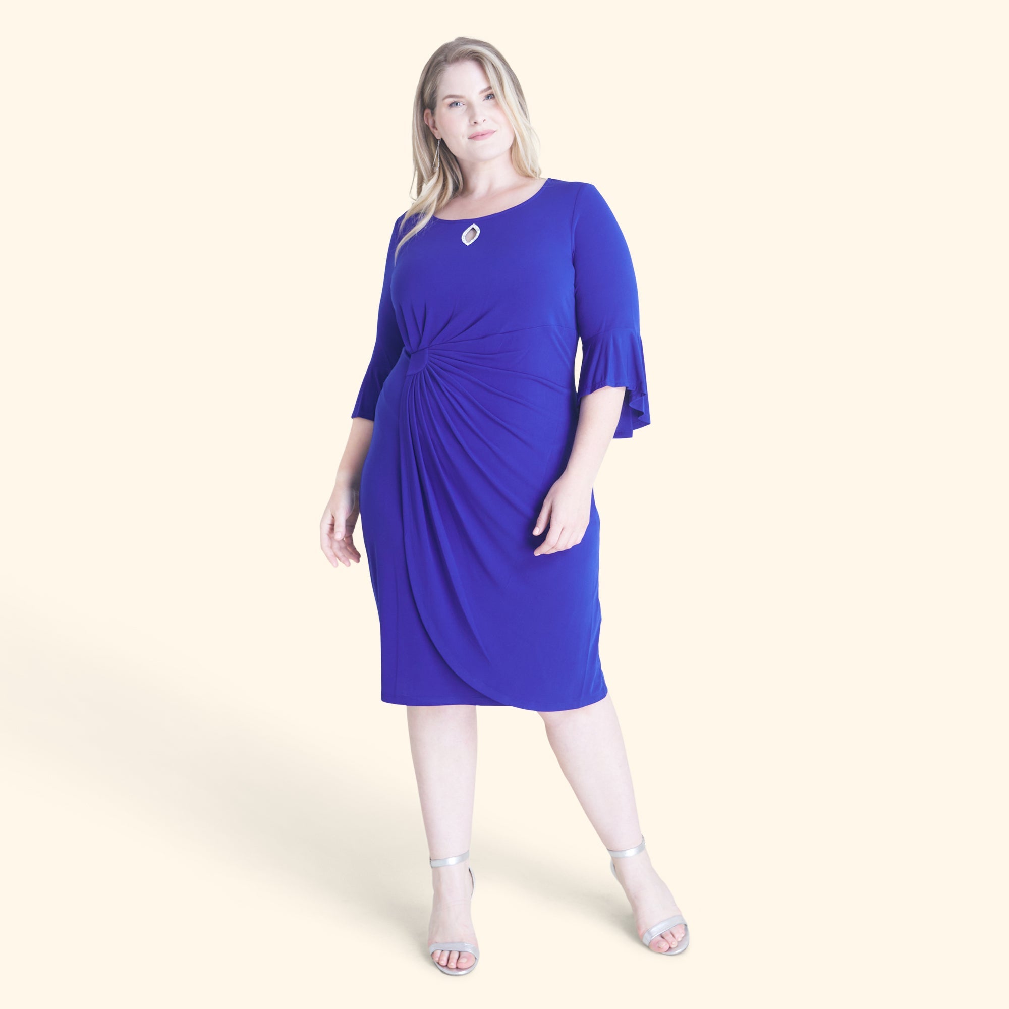 Woman posing wearing Deep Cobalt Lisa 2.0 Deep Cobalt Faux Wrap Dress from Connected Apparel