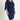 Woman posing wearing Navy Lisa 2.0 Navy Faux Wrap Dress from Connected Apparel
