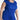 Woman posing wearing Deep Royal Lisa Faux Wrap Dress from Connected Apparel