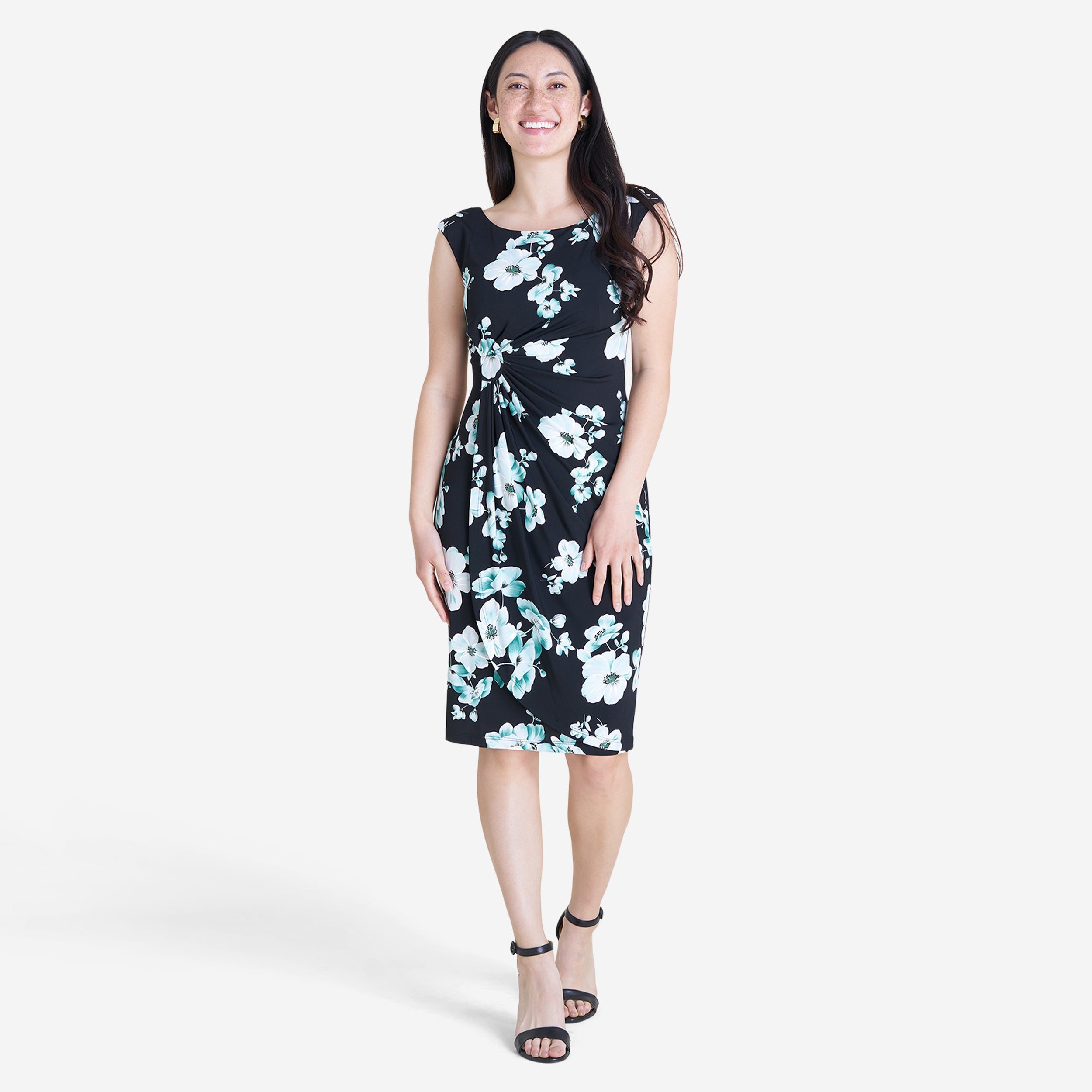 Woman posing wearing Seafoam Lisa Faux Wrap Dress from Connected Apparel