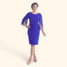 Woman posing wearing Deep Cobalt Lisette Faux Wrap Dress from Connected Apparel