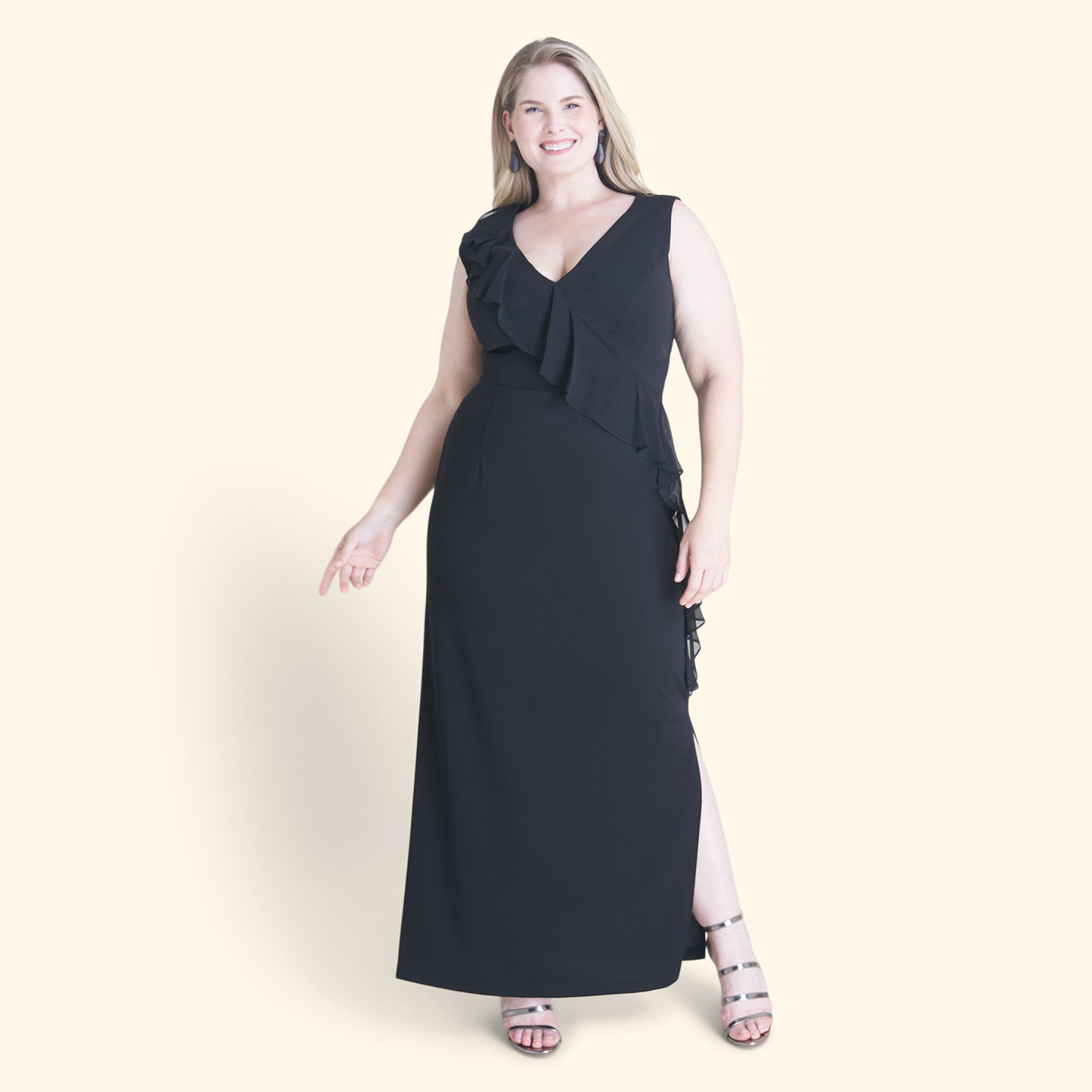 Woman posing wearing Black Sara 2.0 Floor-Length Dress from Connected Apparel