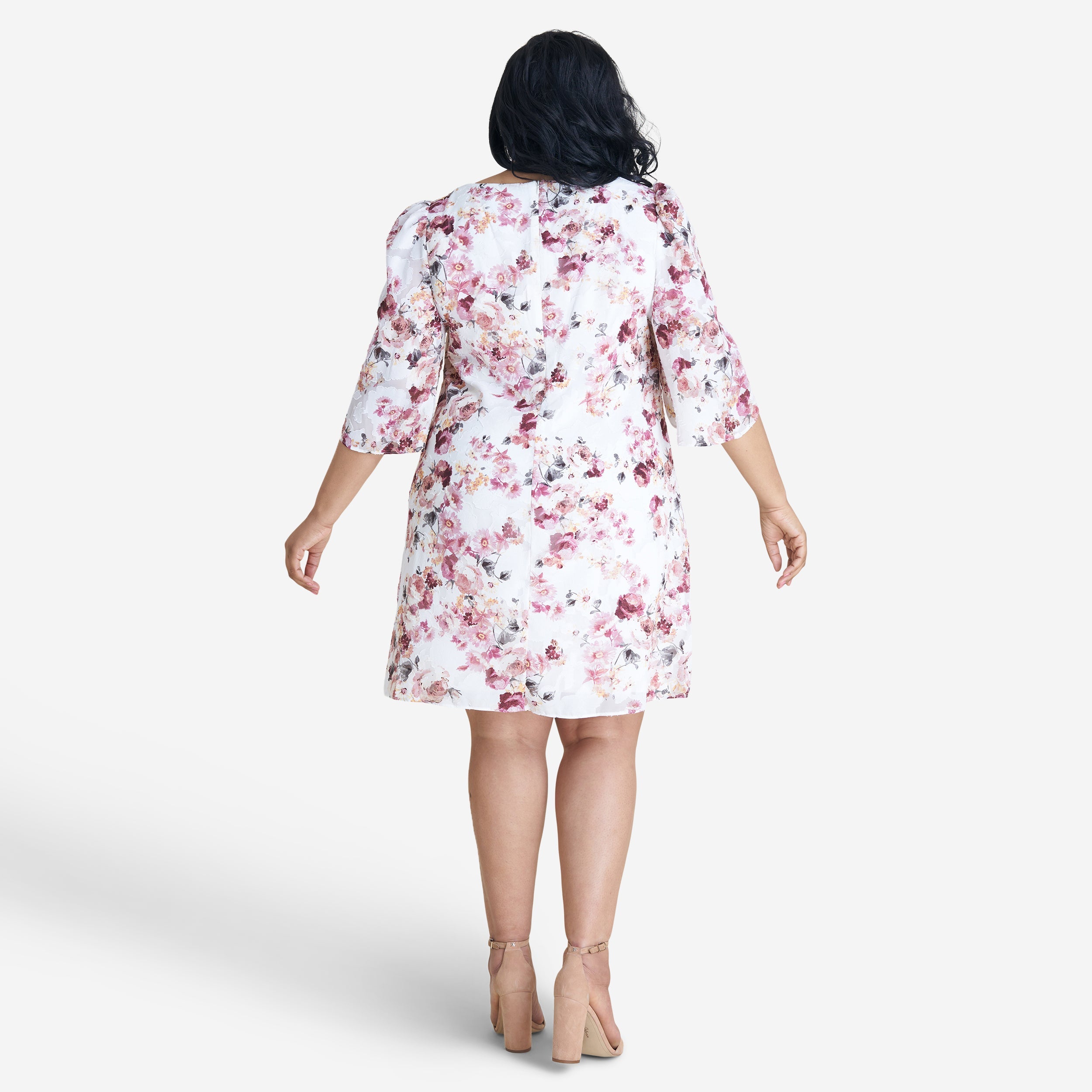 Woman posing wearing Rosewood Stevie Rosewood Floral Sheath Dress from Connected Apparel
