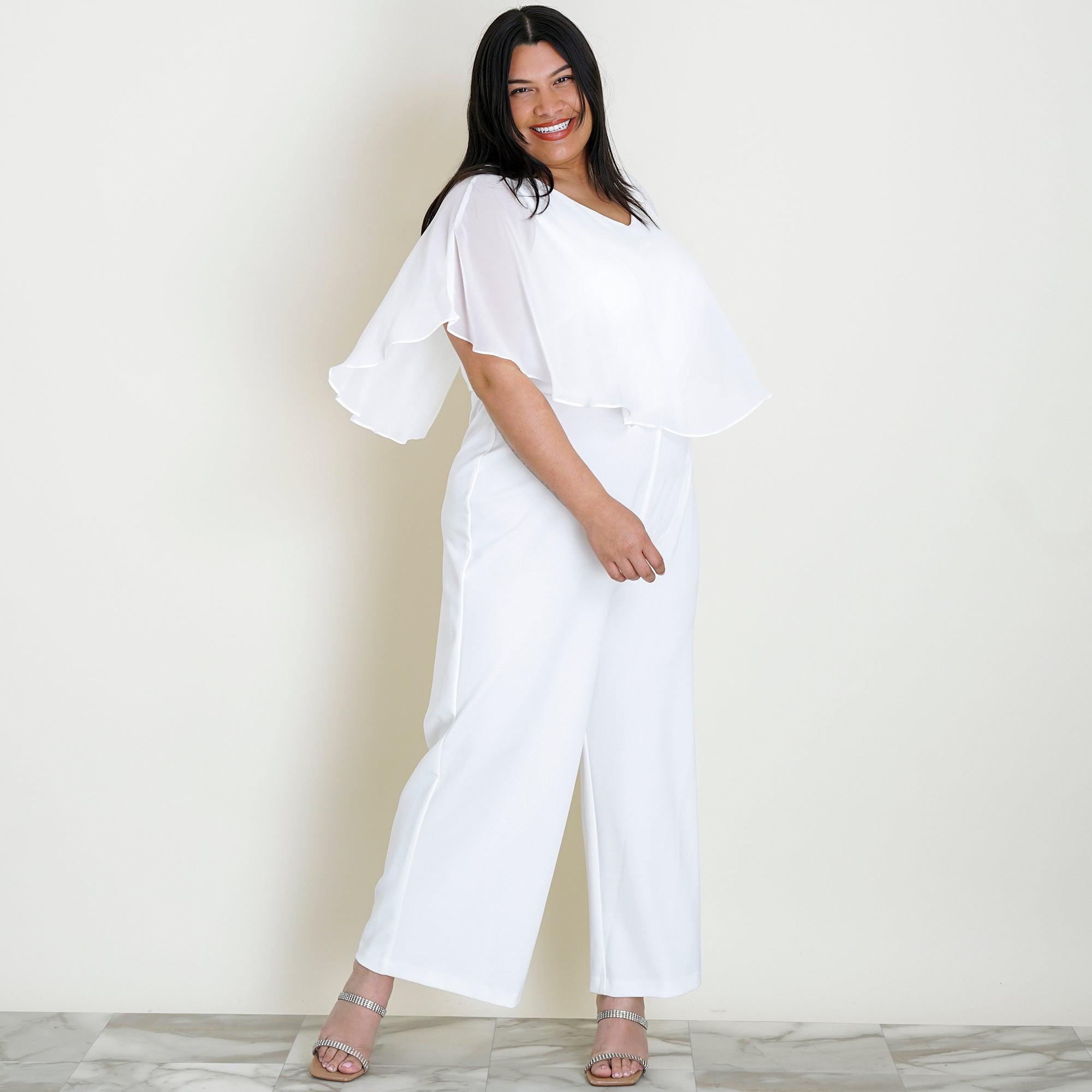 Woman posing wearing Ivory Sunny 2.0 Chiffon Capelet Ivory Jumpsuit from Connected Apparel