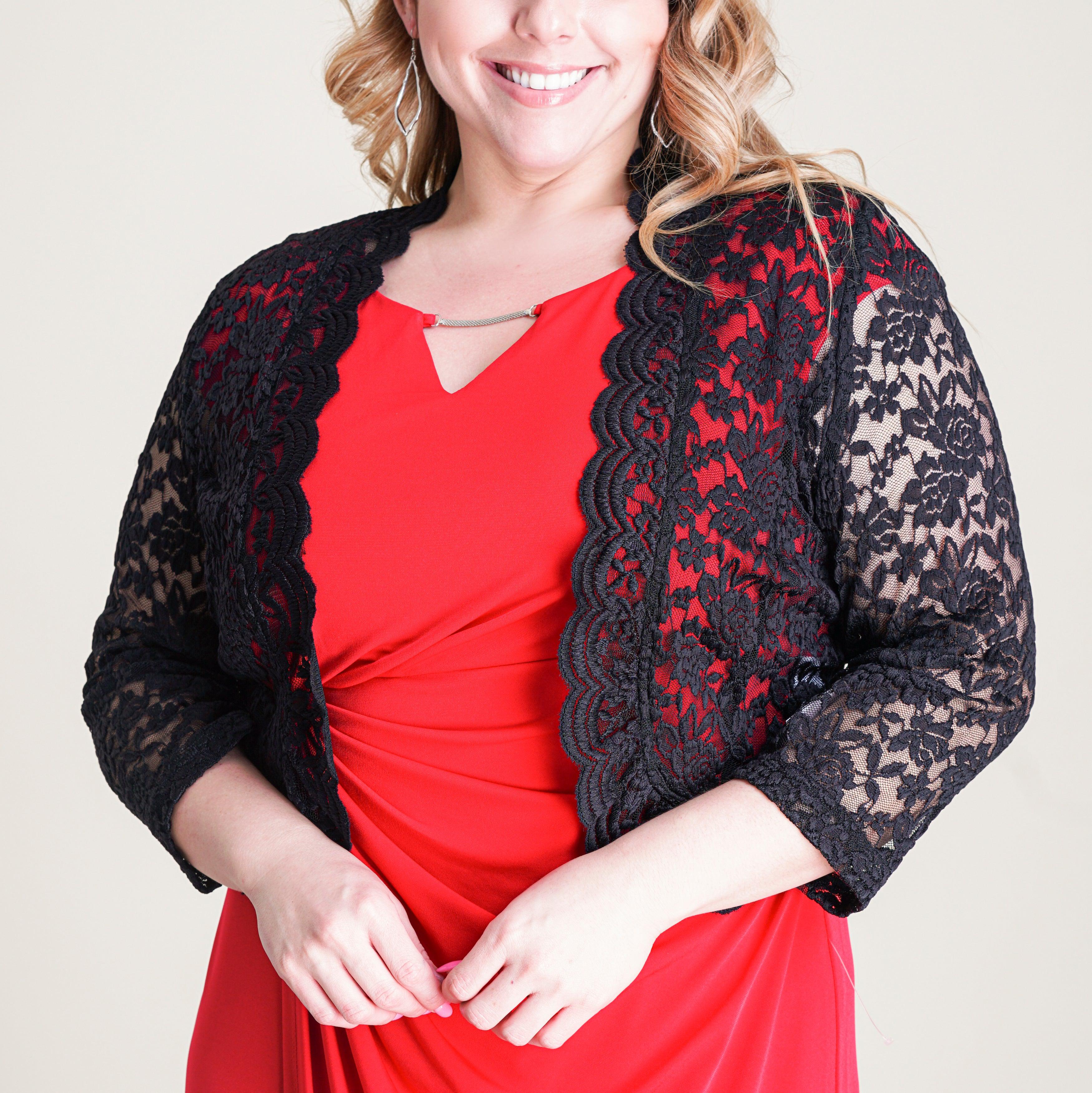 Woman posing wearing Black Talula Scalloped Lace Black Shrug from Connected Apparel
