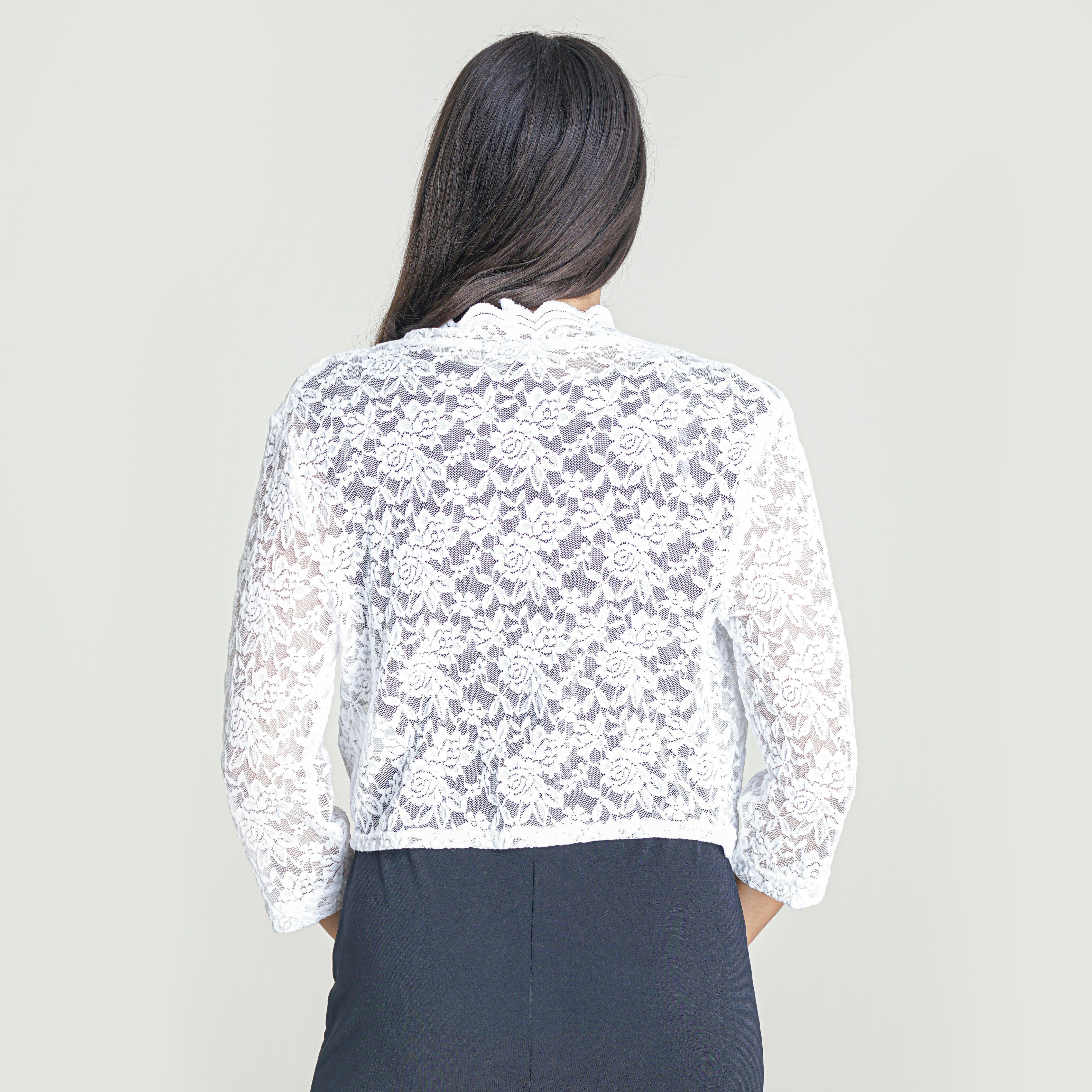 Woman posing wearing White Talula Scalloped Lace White Shrug from Connected Apparel