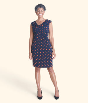 Woman posing wearing Navy/Spice Tina Cowl Neck Dress from Connected Apparel