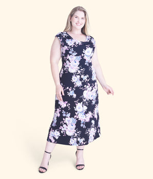 Woman posing wearing Navy/Orchid Tonya Orchid Floral Midi Dress from Connected Apparel