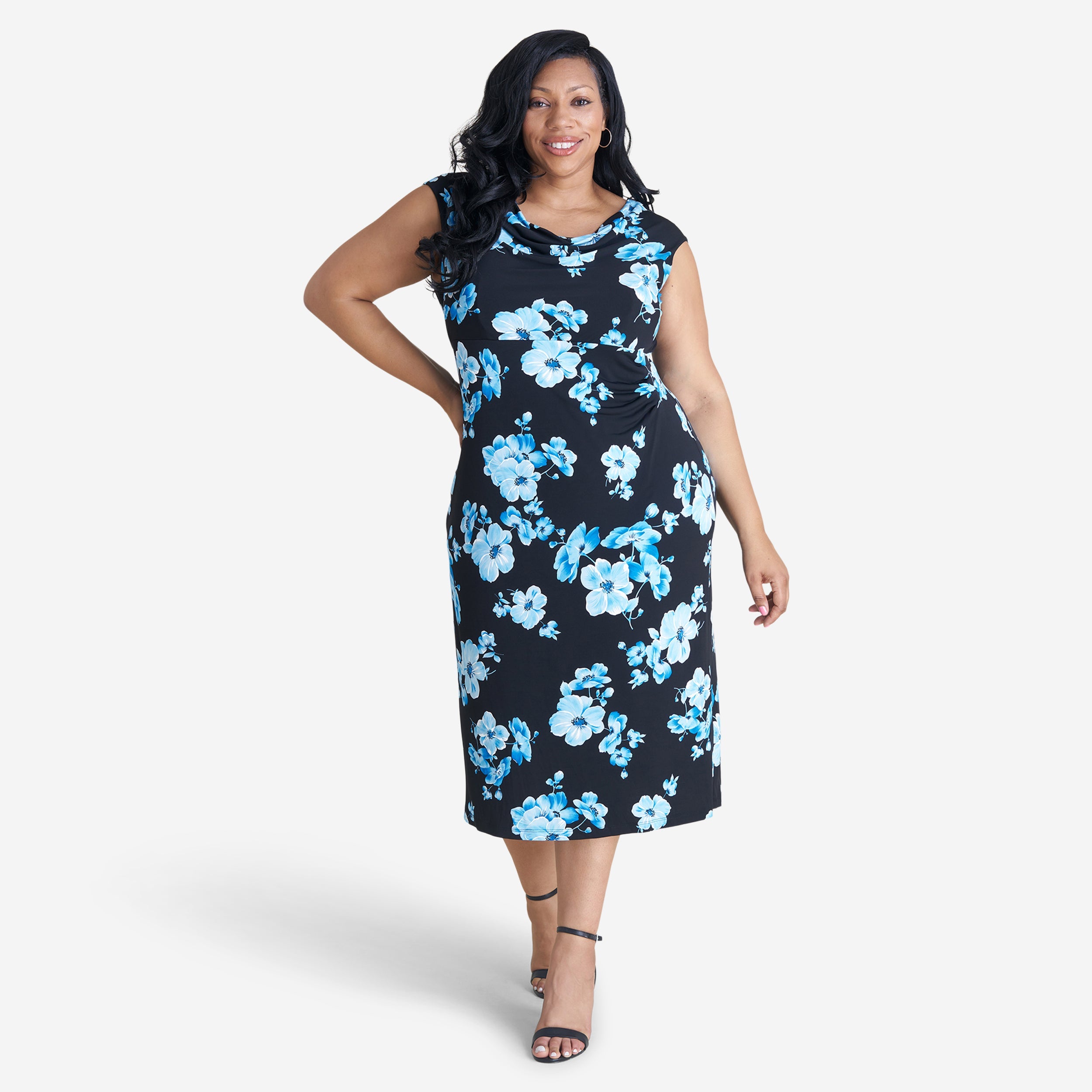 Woman posing wearing Turquoise Tonya Turquoise Floral Midi Dress from Connected Apparel
