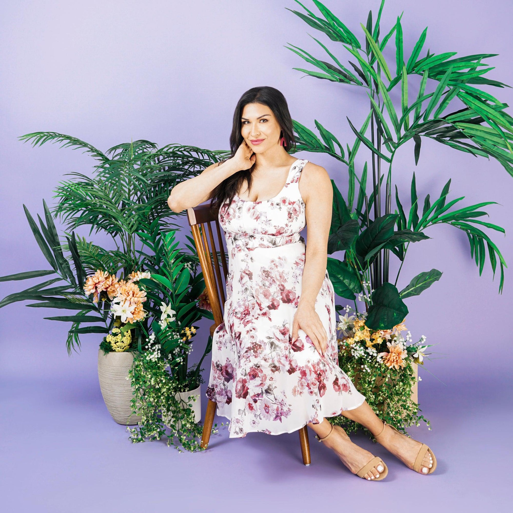 Woman posing wearing Mauve Carly Mauve Floral Chiffon Dress from Connected Apparel