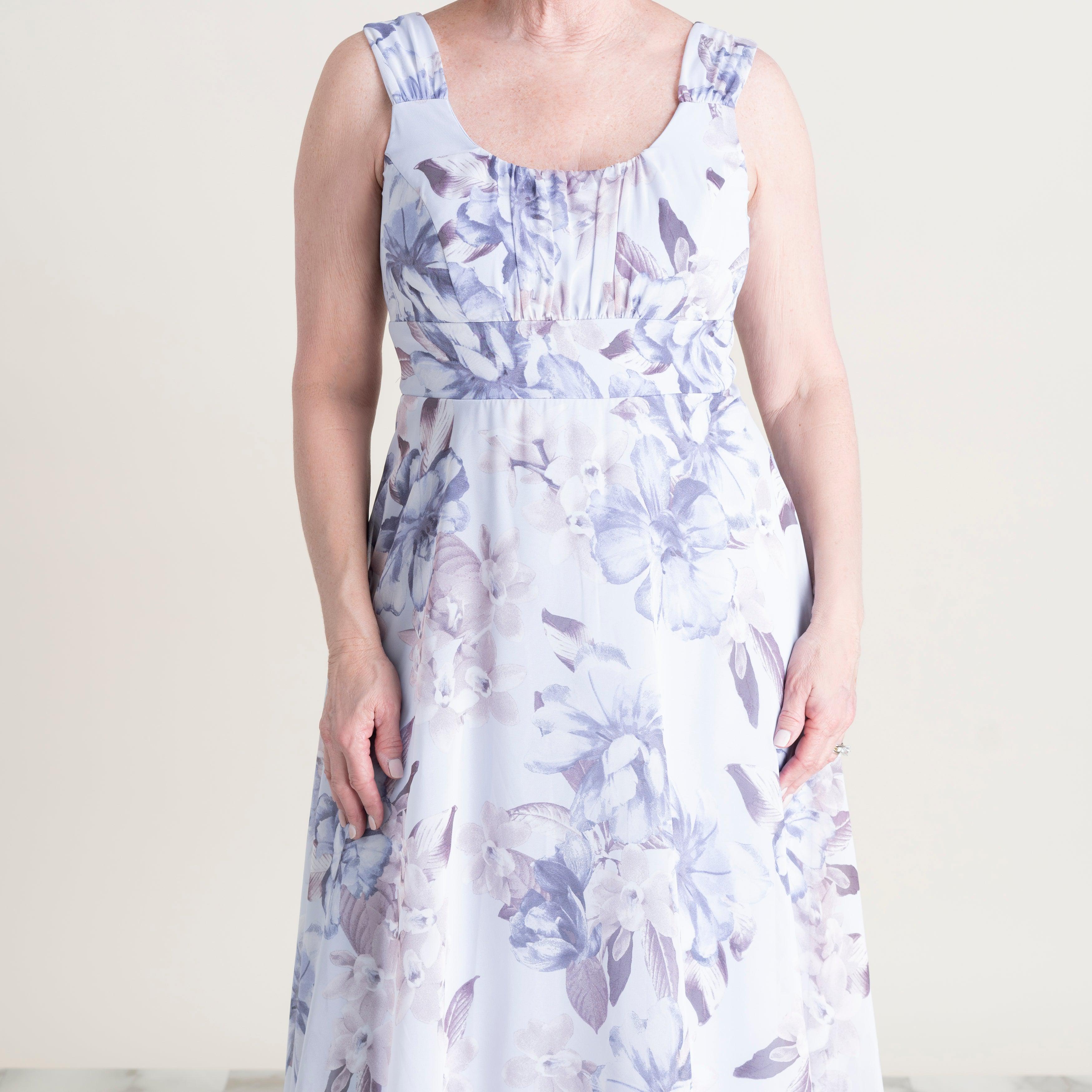 Woman posing wearing Silver Carly Silver Floral Chiffon Dress from Connected Apparel