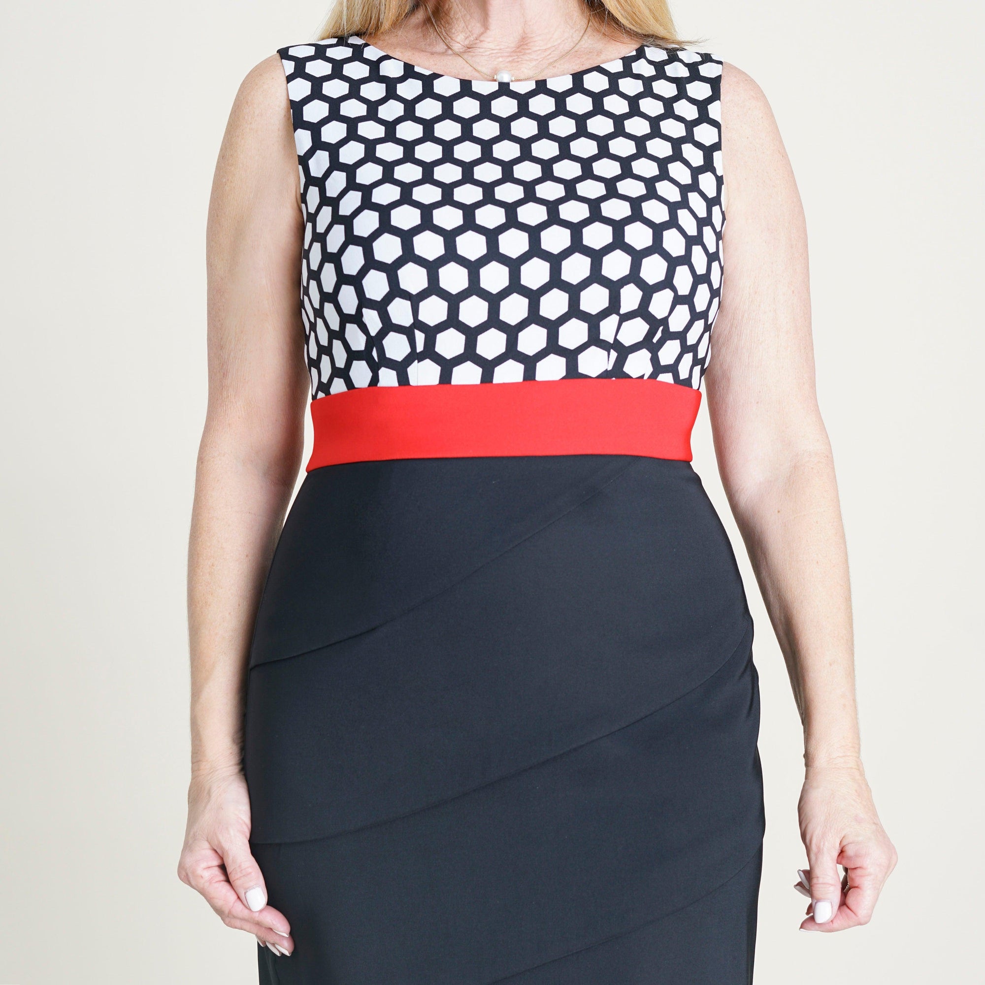 Woman posing wearing Black and red Cassie Color Block Dress from Connected Apparel