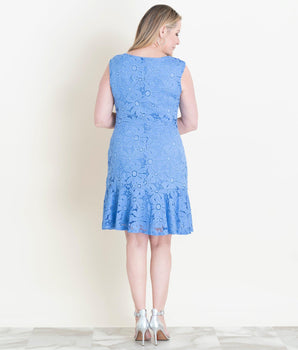 Woman posing wearing Periwinkle Jessie Periwinkle Floral Lace Dress from Connected Apparel