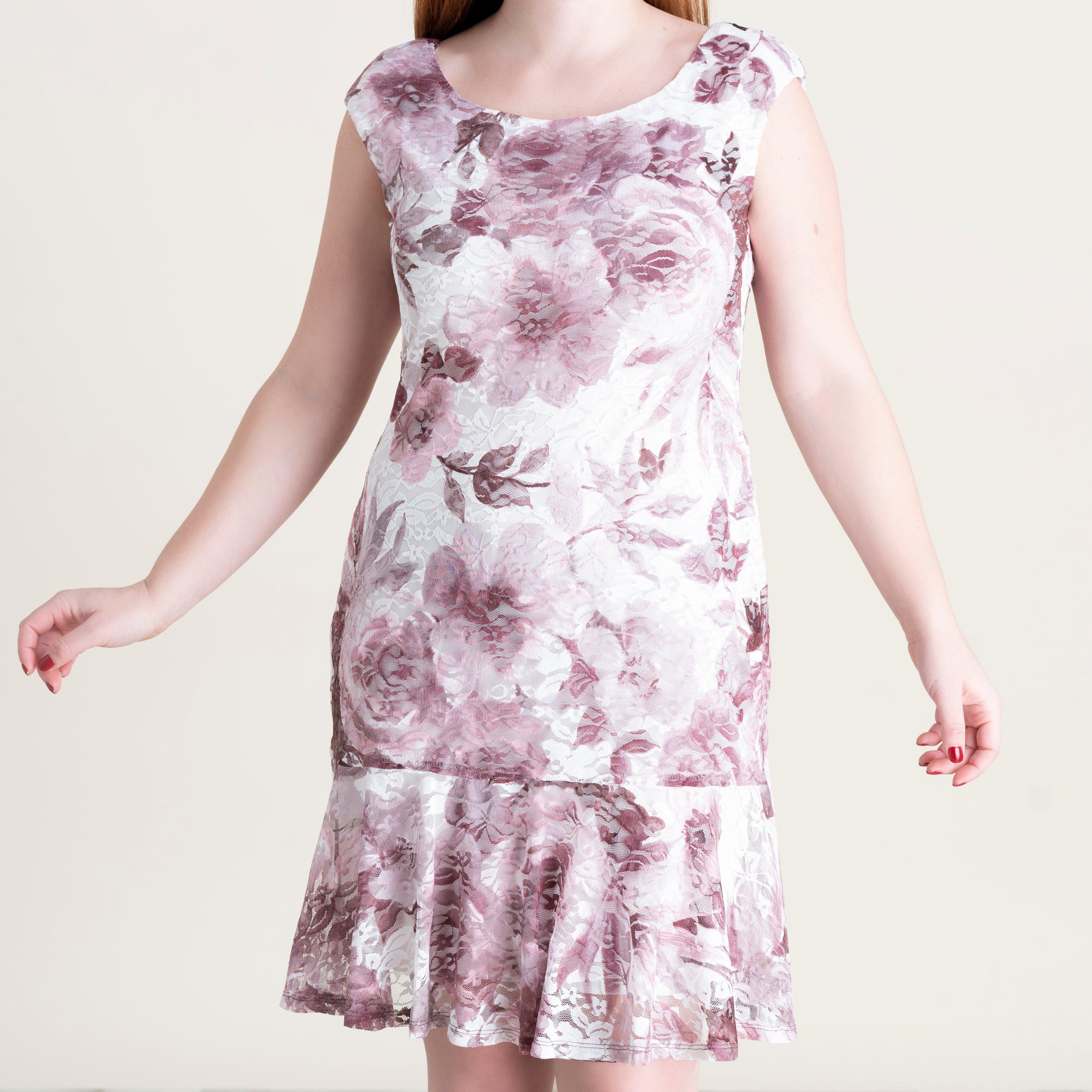 Woman posing wearing Ivory Jessie Printed Lace Dress from Connected Apparel