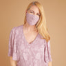 Woman posing wearing Mauve Mauve Burnout Chiffon Face Mask from Connected Apparel