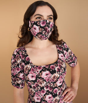 Woman posing wearing Multicolor Spring Pink Floral Face Mask Multipack (Set of 3) from Connected Apparel