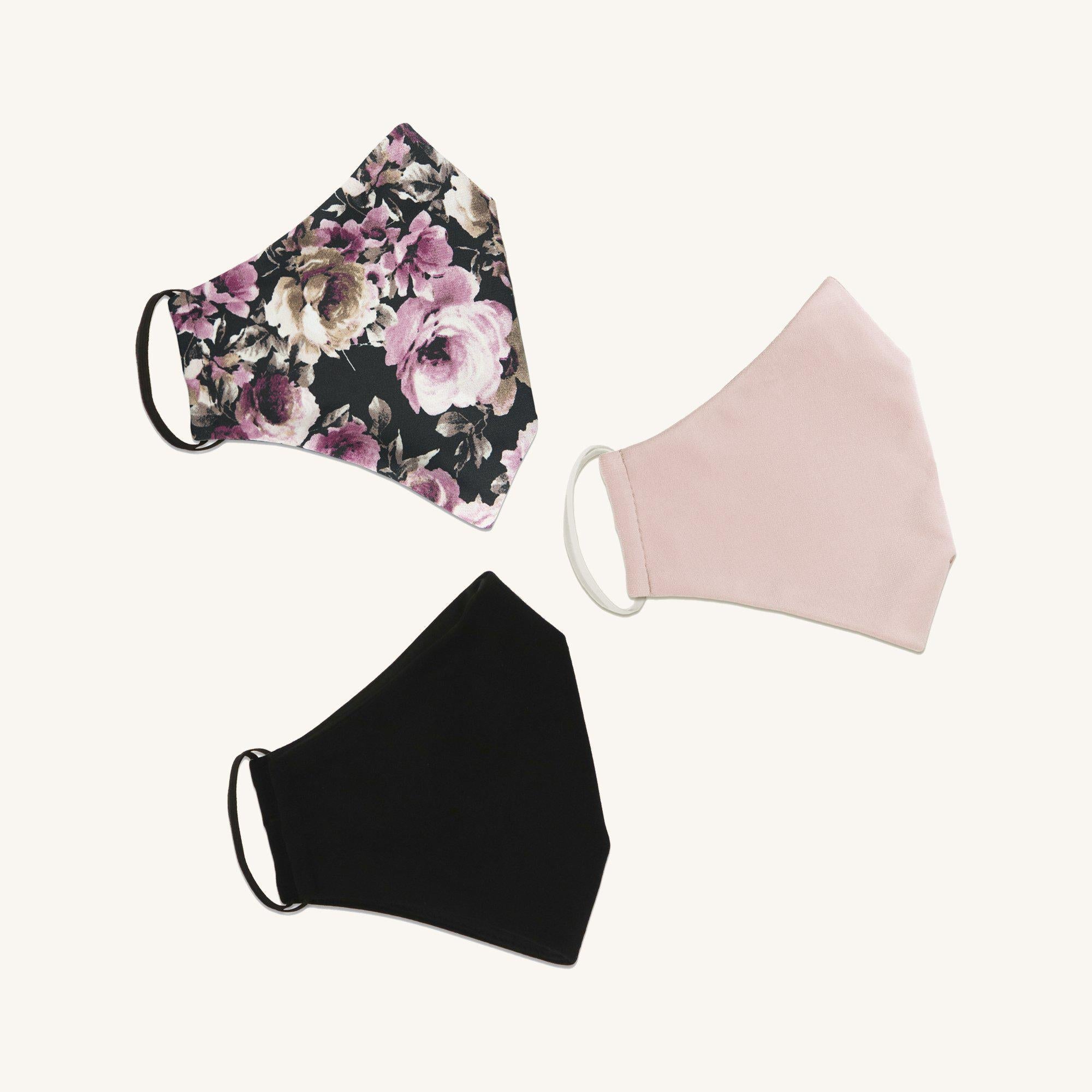 Woman posing wearing Multicolor Spring Pink Floral Face Mask Multipack (Set of 3) from Connected Apparel