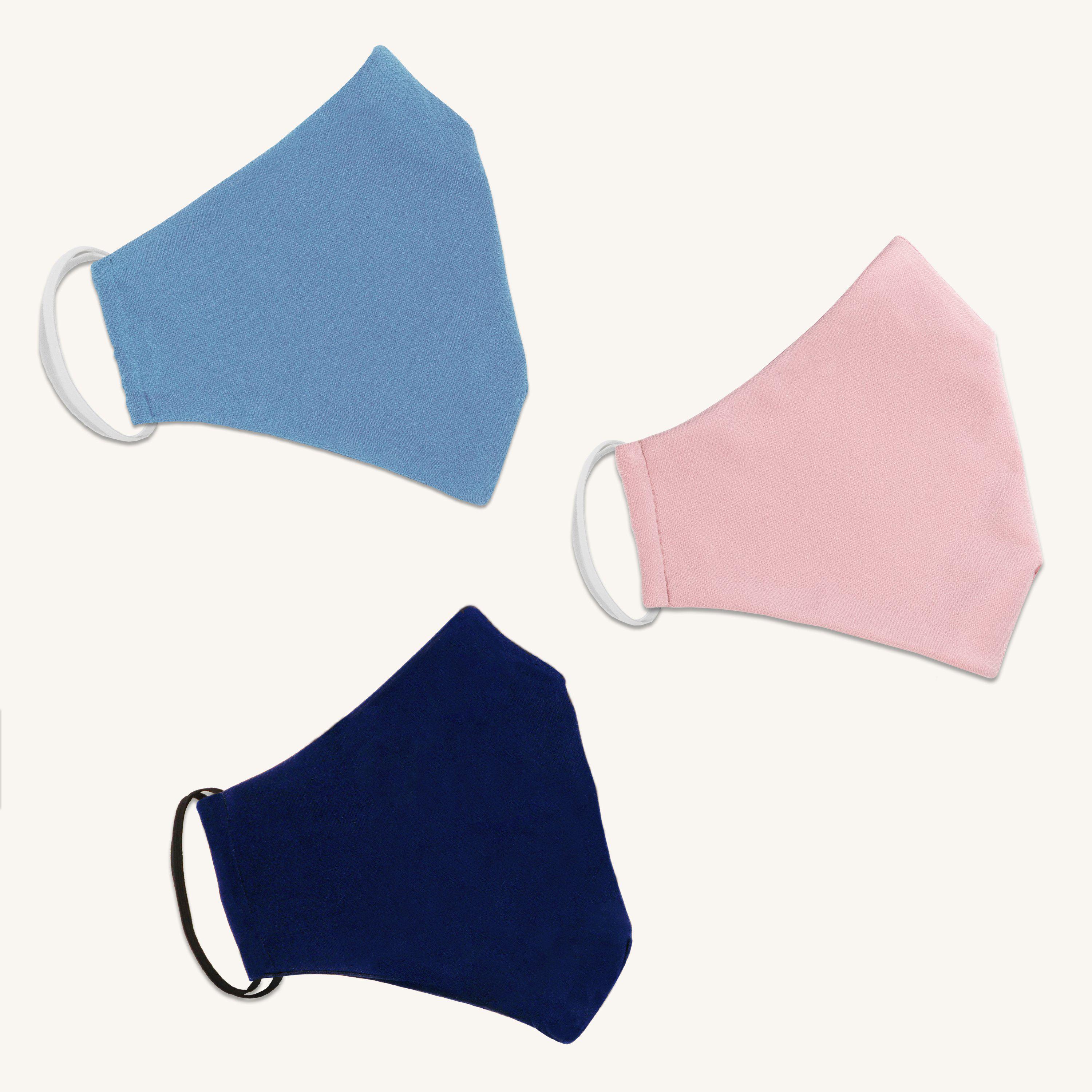 Woman posing wearing Multicolor The Essential Face Mask Multipack in Blue (Set of 3) from Connected Apparel