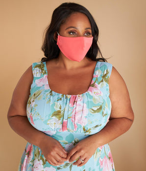 Woman posing wearing Multicolor The Essential Face Mask Multipack in Coral (Set of 3) from Connected Apparel