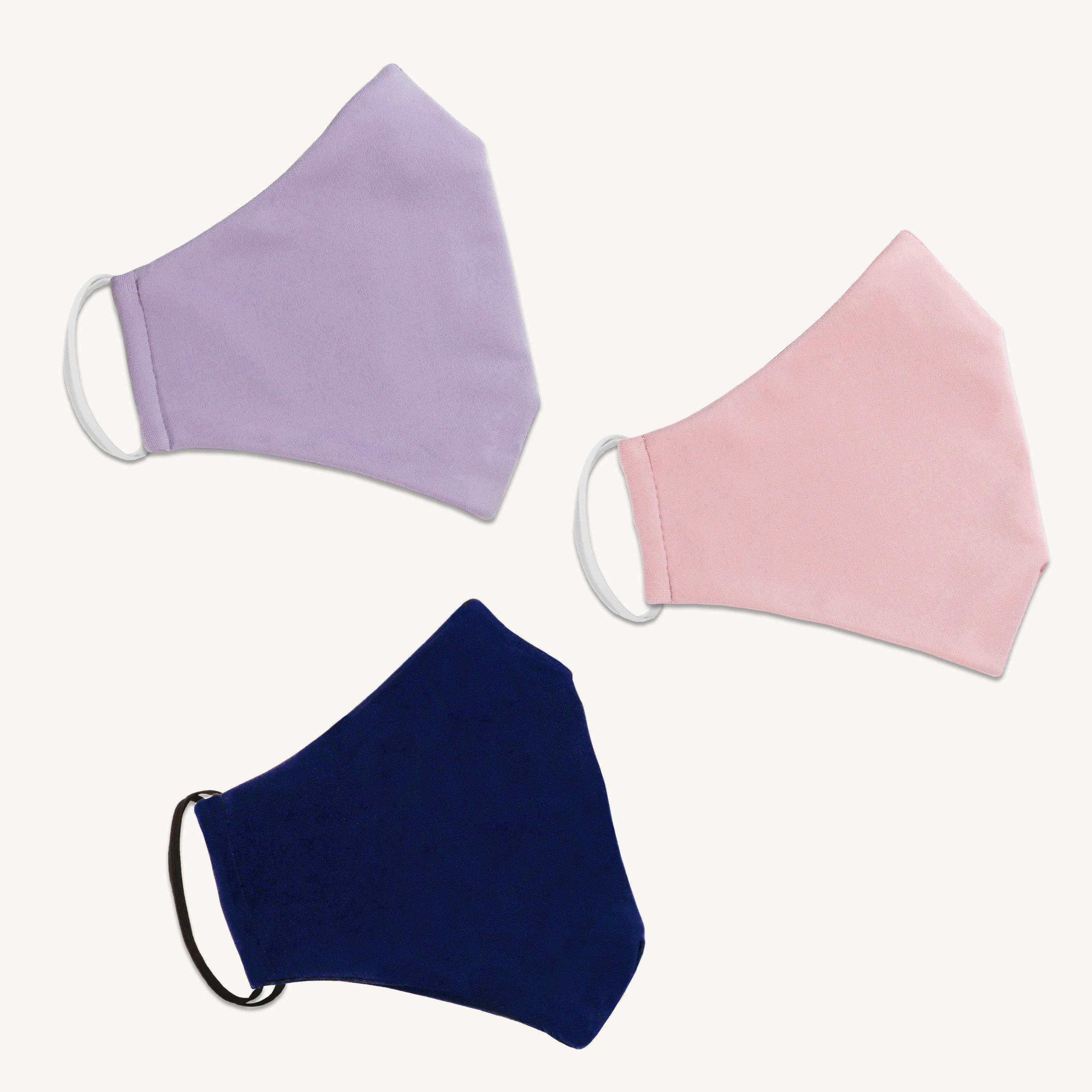 Woman posing wearing Multicolor The Essential Face Mask Multipack in Lavender (Set of 3) from Connected Apparel
