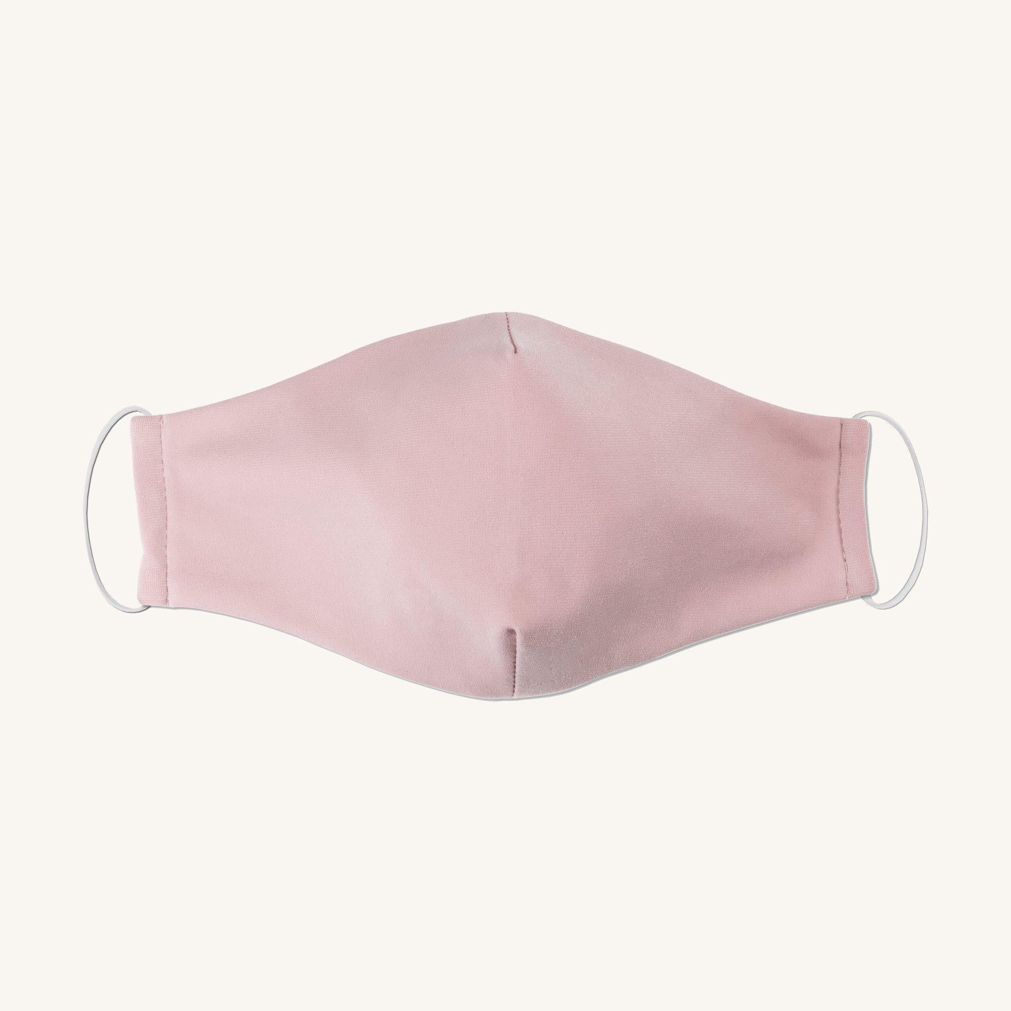 Woman posing wearing Multicolor The Essential Face Mask Multipack in Rose (Set of 3) from Connected Apparel