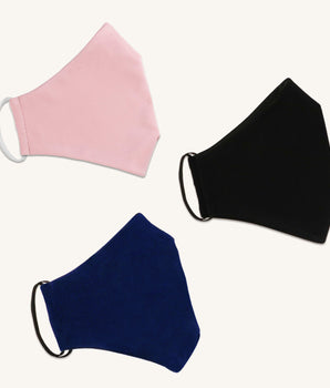 Woman posing wearing Multicolor The Essential Face Mask Multipack in Rose (Set of 3) from Connected Apparel