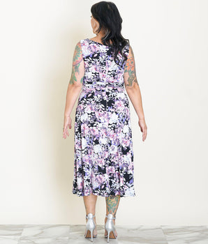 Woman posing wearing Dusty Mauve Sandra Dusty Mauve Floral Midi Dress from Connected Apparel