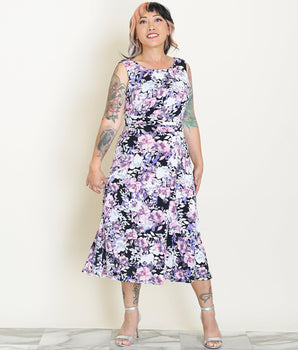 Woman posing wearing Dusty Mauve Sandra Dusty Mauve Floral Midi Dress from Connected Apparel
