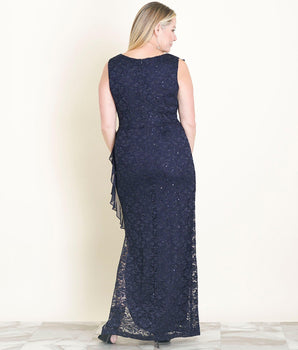 Woman posing wearing Navy Sara 2.0 Navy Sequin Lace Floor Length Dress from Connected Apparel
