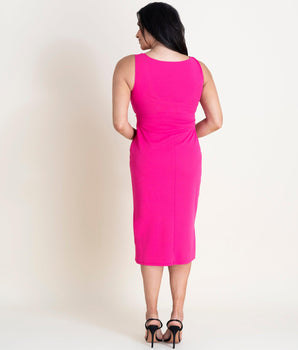 Woman posing wearing New Fuchsia Selena Fuchsia Knot Dress from Connected Apparel