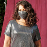 Woman posing wearing Silver CAxLZ Silver Sequin Face Mask from Connected Apparel