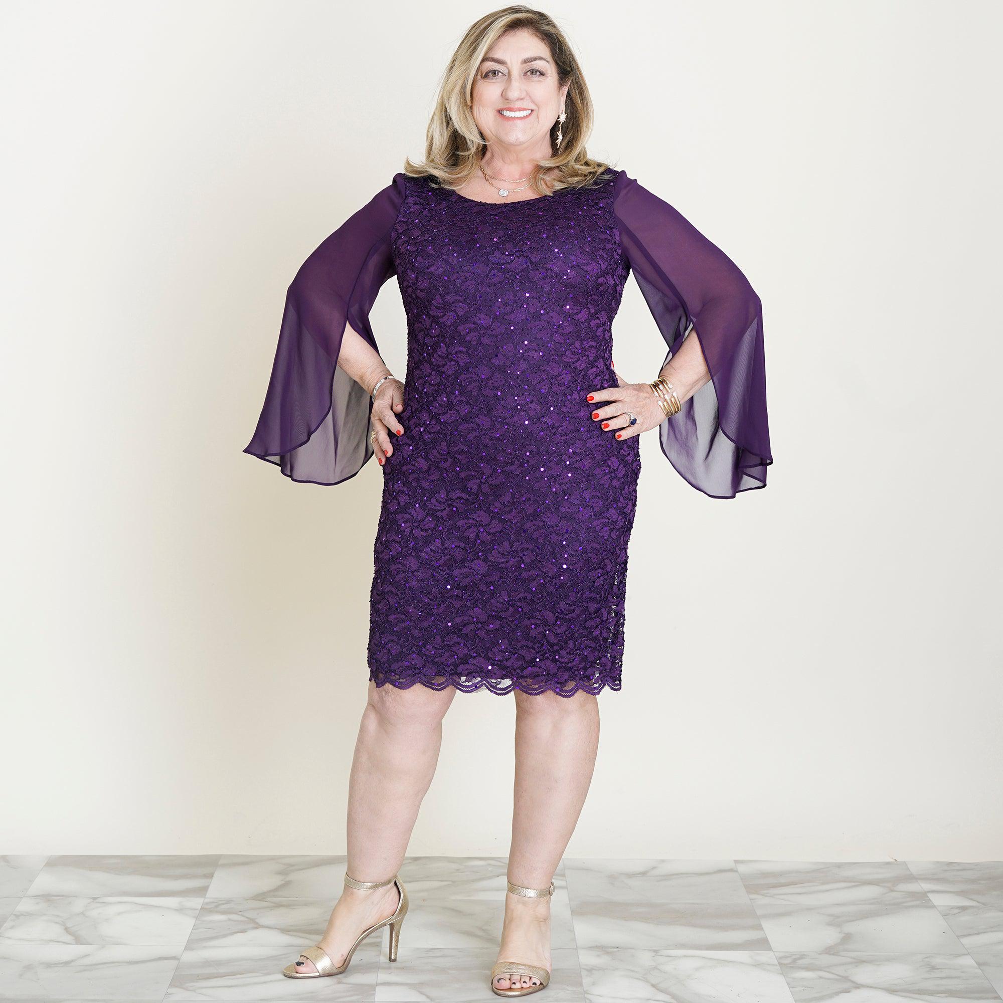 Woman posing wearing Aubergine Stevie Aubergine Sequin Lace Dress from Connected Apparel