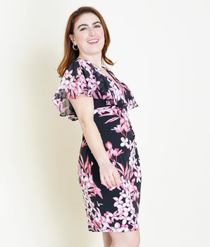 Woman posing wearing Rose Sunny Rose Floral Bodycon Dress from Connected Apparel