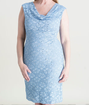 Woman posing wearing Sky Tina Sky Blue Sequin Lace Cocktail Dress from Connected Apparel