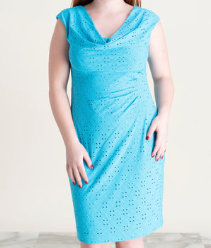 Woman posing wearing Turquoise Tina Turquoise Eyelet Cowl Neck Dress from Connected Apparel