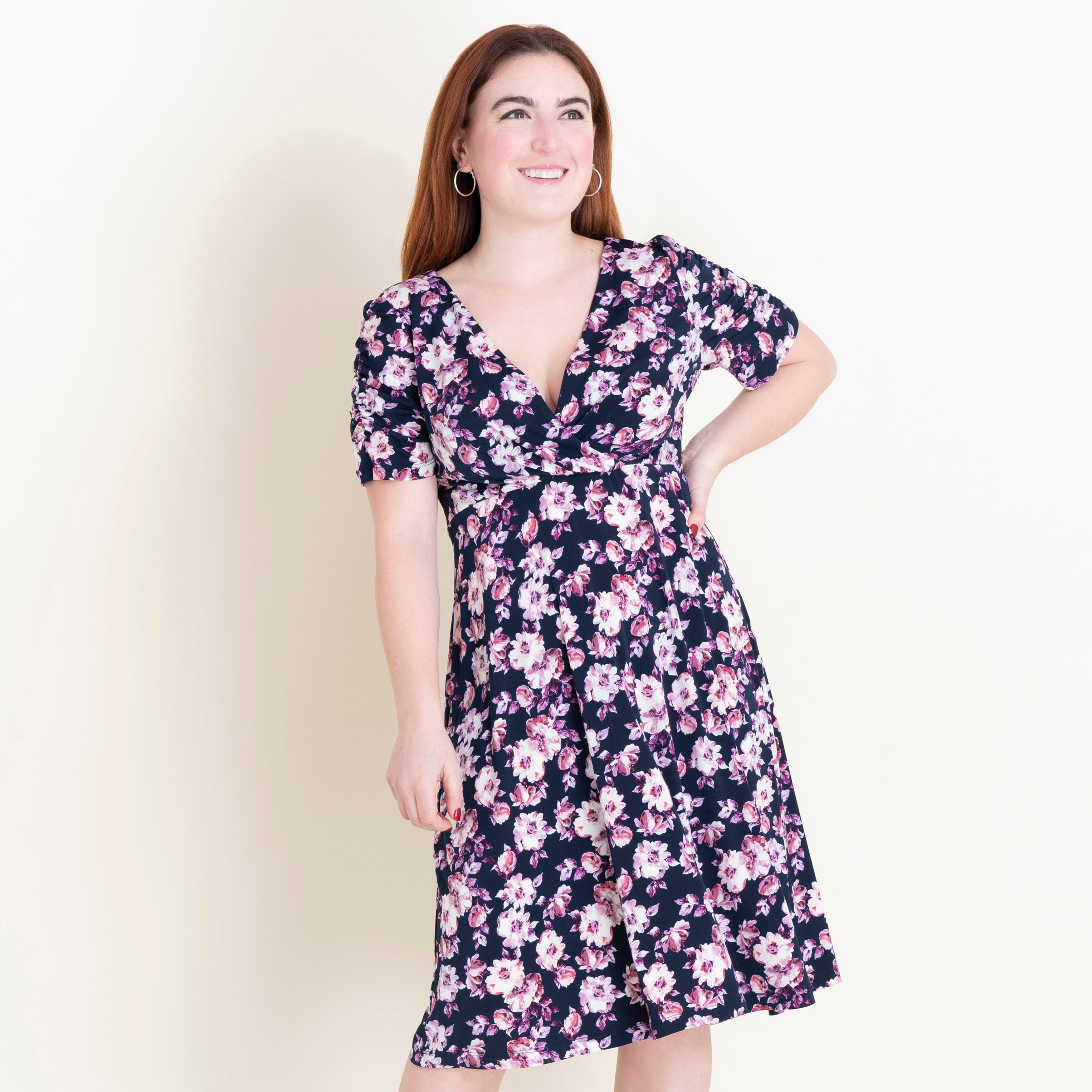 Woman posing wearing Navy/Mauve Valerie Floral Fit and Flare Dress from Connected Apparel